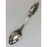 A finely chased cast silver gilt spoon. London 187