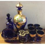 A collection of blue Venetian glass decorated in b
