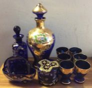 A collection of blue Venetian glass decorated in b