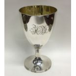 A heavy George III silver goblet with gilt interio