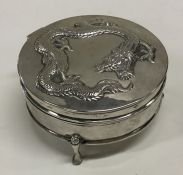 A heavy Chinese silver hinged top box decorated wi