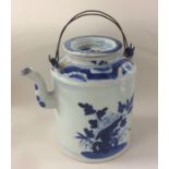 A large Eastern blue and white teapot with double