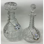 Two good cut glass decanters together with Coalpor