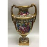 A tall late Victorian two handled ewer with gilt d