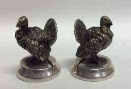 A heavy pair of novelty silver menu holders in the