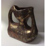 An unusual tarnished copper effect pottery two han