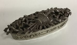 A good quality Edwardian silver oval box of shaped