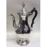 A massive George III silver baluster shaped coffee