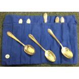 A set of seven Sterling silver spoons contained wi