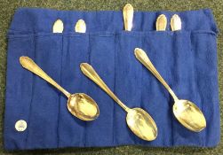 A set of seven Sterling silver spoons contained wi