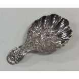 A rare chased silver caddy spoon attractively deco