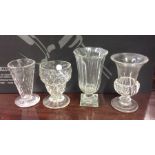 An Antique tapering fluted glass vase on square pe
