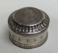 An early large Georgian silver counter box embosse