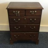 A good Georgian bachelor's chest of five drawers w
