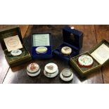 A collection of Royal Worcester pill boxes with hi