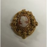 A Victorian gold brooch decorated with leaves and