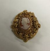 A Victorian gold brooch decorated with leaves and