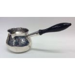 A good quality George II silver brandy pan of typi
