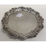 An Edwardian silver waiter with shell border. Shef