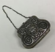 A Russian silver filigree decorated handbag on sus