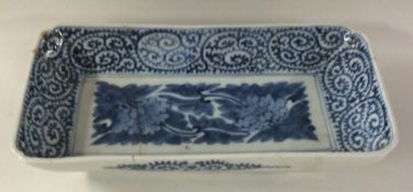 A rectangular Chinese blue and white bowl with flo