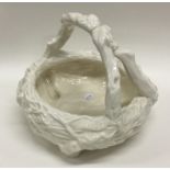 A Royal Worcester textured porcelain basket. Est.