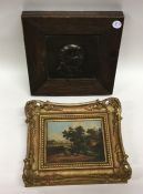 An unusual oak framed bronze plaque depicting 'Pic
