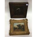 An unusual oak framed bronze plaque depicting 'Pic