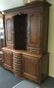 A large Continental oak six drawer kitchen dresser