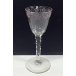 A rare engraved facet stemmed Georgian wine glass