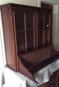 A Georgian mahogany bookcase with matching wall br