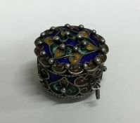 An attractive silver and enamelled hinged top box