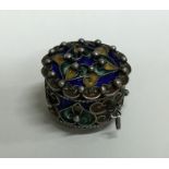 An attractive silver and enamelled hinged top box