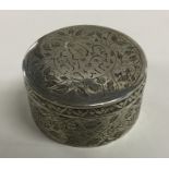 A heavy circular Antique Persian silver box with l