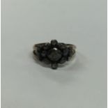 An Antique rose diamond ring in gold mount. Approx