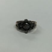 An Antique rose diamond ring in gold mount. Approx