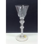 A good Georgian air twist wine glass with double k