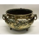 A large Chinese circular brass censer decorated wi