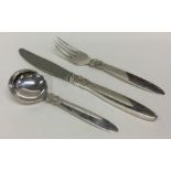 GEORG JENSEN: A good silver three piece cutlery se