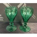 A pair of Antique green glass drinking glasses wit