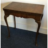 A Continental walnut hinged top card table on four