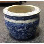 A Chinese blue and white jardinière decorated with