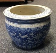 A Chinese blue and white jardinière decorated with