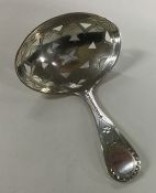 A Georgian silver pierced caddy spoon with bright