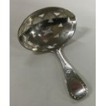 A Georgian silver pierced caddy spoon with bright