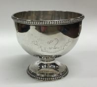 A heavy Georgian silver bowl with beaded rim. Lond