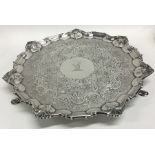 A good chased silver salver with central armorial.