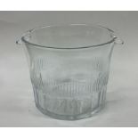A Georgian glass double lipped bowl with fluted si