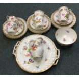 A floral decorated Dresden tea service. Est. £30 -