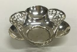 An attractive pierced silver sweet dish. London. A